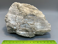 a clear slab of gypsum selenitie with fractures and white areas